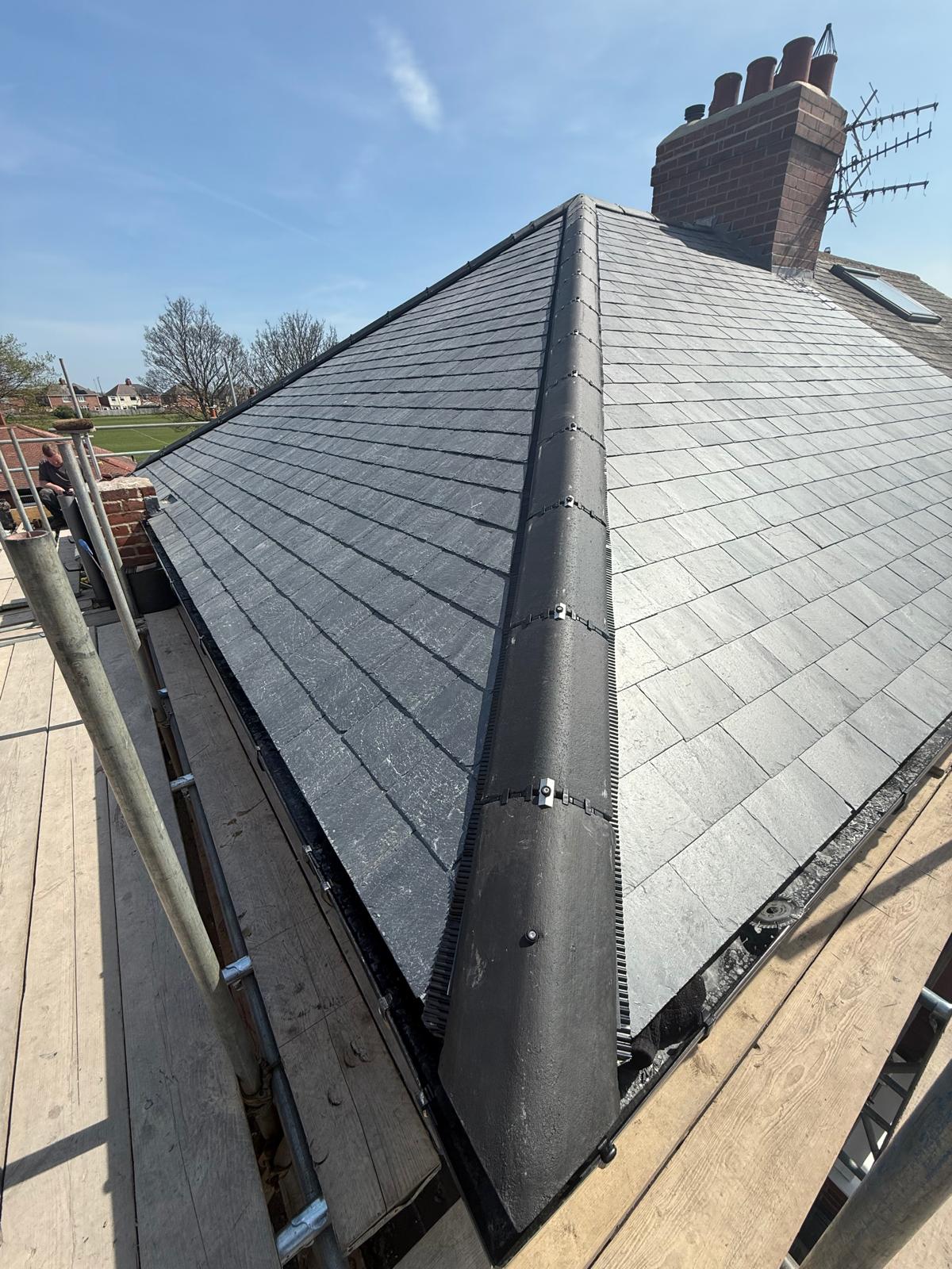 Completed Spanish slate roof replacement by Legge Roofing